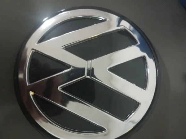 EMBLEMA/LOGO TAPA TRASERA